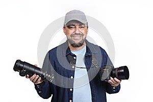 Professional photographer with camera and lens on white background