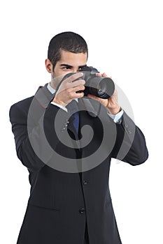 Professional photographer photographing with a digital dslr camera