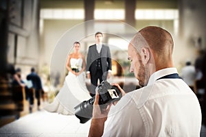 Professional photographer in a wedding