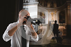 Professional photographer in a wedding