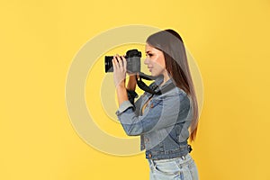 Professional photographer working on background in studio