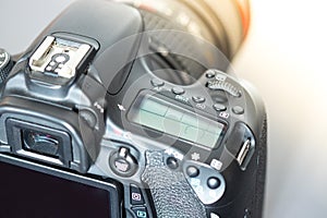 Professional photographing: Reflex camera with telephoto lens, cutout
