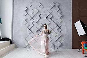 Professional photography studio showing behind the scenes lights on bride model