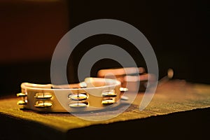 professional plastic tambourine with metal arabesques photo