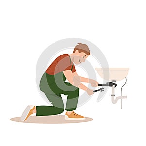 Professional plumbing services. A worker with an adjustable wrench is repairing plumbing in the sink. Home renovation