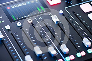 Professional podcast mixing console with faders and adjusting buttons, Audio sound mixer console. Sound mixing desk. Music mixer c