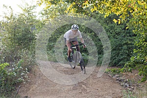 Professional racer on cyclocross training outdoors