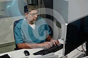 Professional Radiographer Using Computer photo