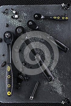 Professional ratchet tools placed on a black background
