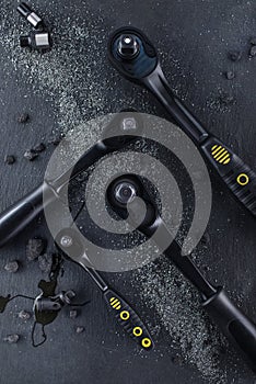 Professional ratchet tools placed on a black background