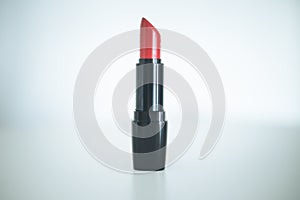 Professional red lipstick cosmetic product, white background