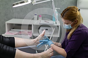 Professional relaxing foot massage performed by a podiatrist.