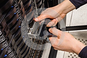 IT Professional Replacing Hard Disk In San At Datacenter