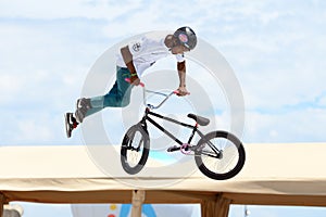 A professional rider at the MTB (Mountain Biking) competition on the Dirt Track