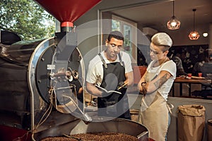 Professional roasters working in a coffee company