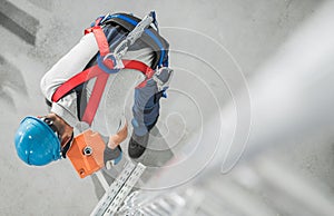 Scaffolding Counterweight Installing by a Worker