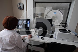 Professional Scientists Work in the Brain Research Laboratory. Neurologists Neuroscientists Surrounded by Monitors