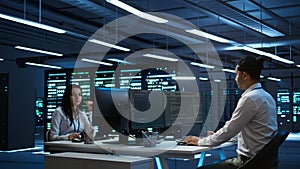 IT professional in server hub establishing performance benchmarks