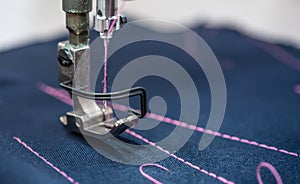 Professional sewing machine close-up. Modern textile industry