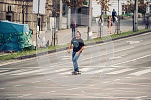 Professional skateboarder riding a skateboard on the capital cit