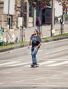 Professional skateboarder riding a skateboard on the capital cit