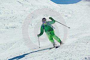 Professional skier athlete skiing of ski resort.Winter vacation and sport concept