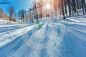 Professional skier athlete skiing of ski resort.Winter vacation and sport concept