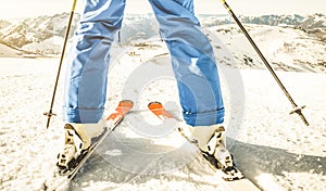 Professional skier at top of the slope in french alps ski resort