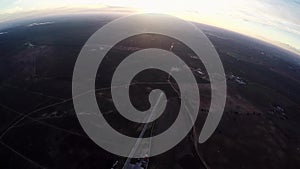 Professional skydiver fly on parachute in sky. Horizon. Adrenaline. Evening.