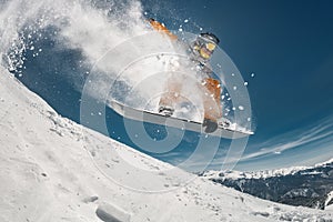 Professional snowboarder jump at ski slope