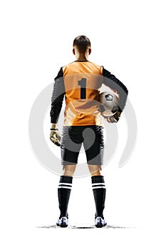 Professional soccer goalkeeper in action on white background