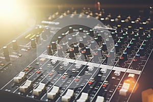 Professional sound mixer in studio for music and sound recording equipment