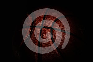 Professional sport equipment isolated on black studio background. Basketball ball.