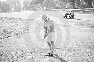 professional sport outdoor. male golf player on professional golf course.