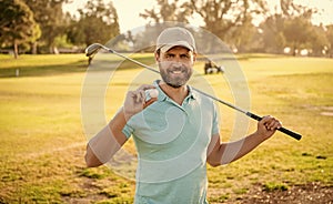 professional sport outdoor. showing ball. male golf player on professional golf course.