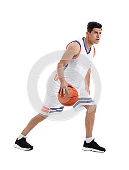 Professional sportsman playing basketball on white background