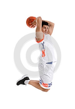 Professional sportsman playing basketball on white background