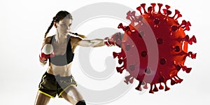 Professional sportswoman kicking, punching coronavirus model - fight the desease, flyer