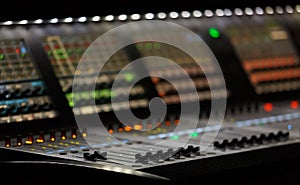 Professional stage lighting controller desk. Industrial light board on concert in music hall