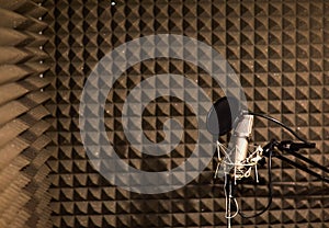 Professional studio microphone for voice recording. Sound recording studio. Soundproof room