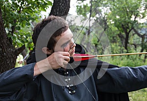 Professional target archery, hunting in the forest