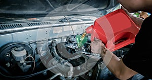 Professional Technician  mechanic worker service  center for fixing repairs change engine oil