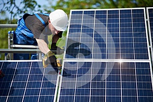 Stand-alone exterior solar panel system installation, renewable green energy generation concept.