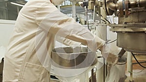 Professional technologist in production plant checking productivity and quality. Clip. Pharmaceutical Factory Worker in