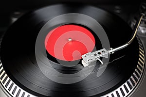 Professional turntable close-up. Analog stage audio equipment for concert in nightclub. Play mix music tracks on vinyl