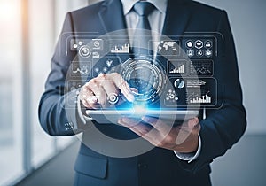 Professional using digital tablet with futuristic data interface overlay