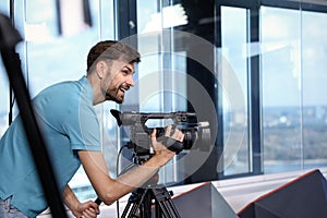 Professional video camera operator working