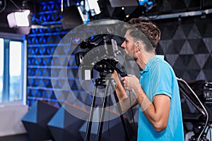 Professional video camera operator working