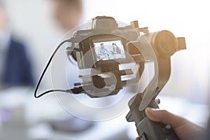 Professional videomaker shooting a video