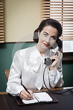 Professional vintage secretary on the phone